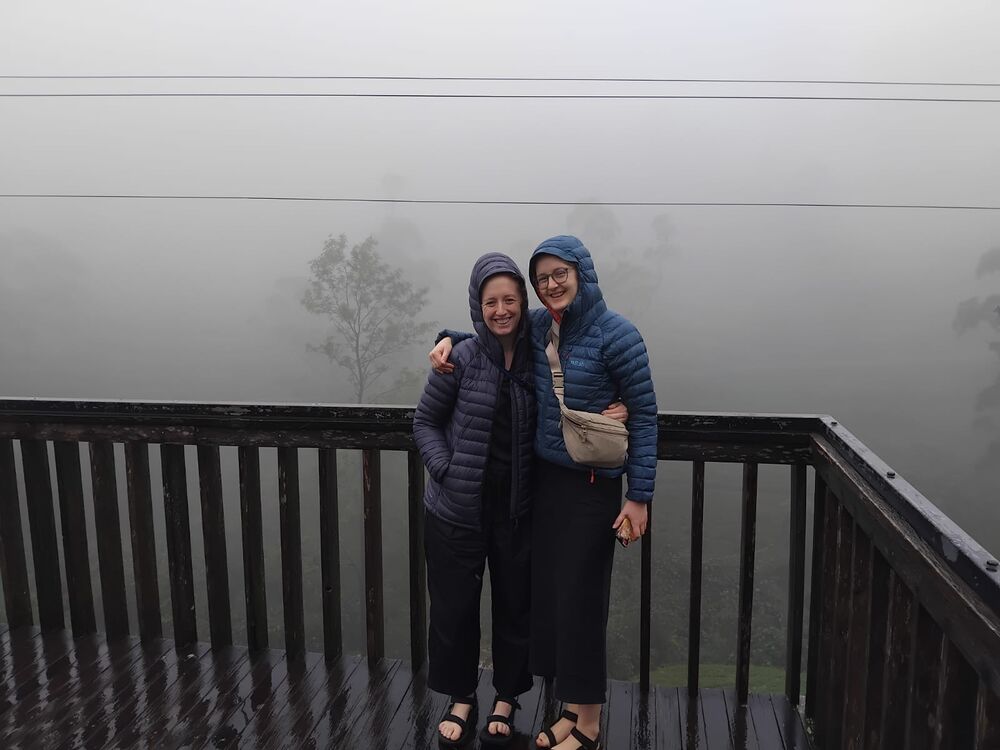 Guests at a fogged-in viewpoint in the Sri Lanka hill country