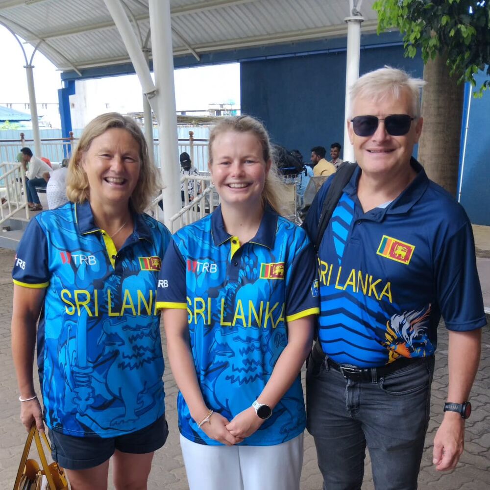 Guests wearing Sri Lanka cricket jerseys during their trip