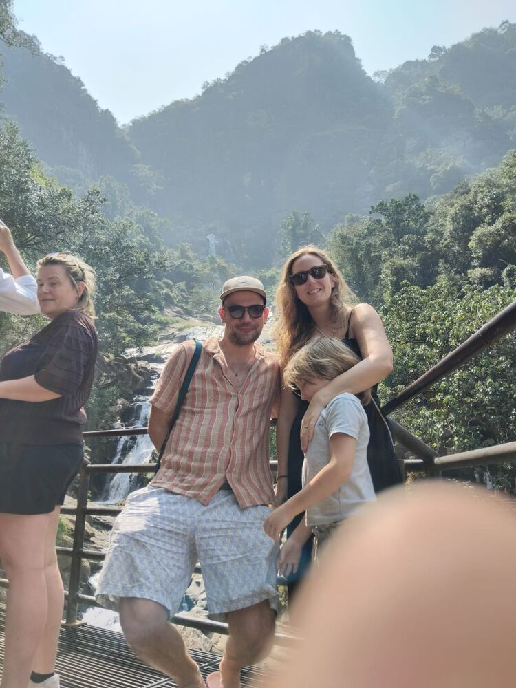A family at Ravana Falls, Sri Lanka hill country