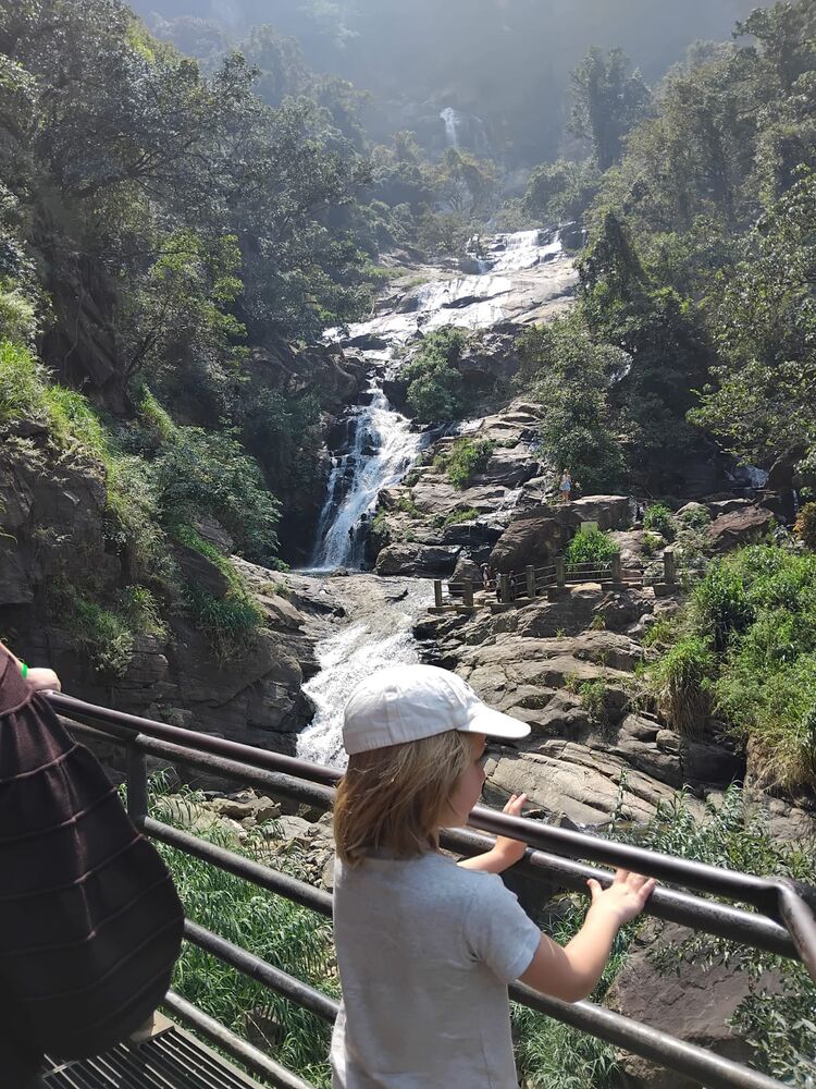 A child taking in the view at Ravana Falls