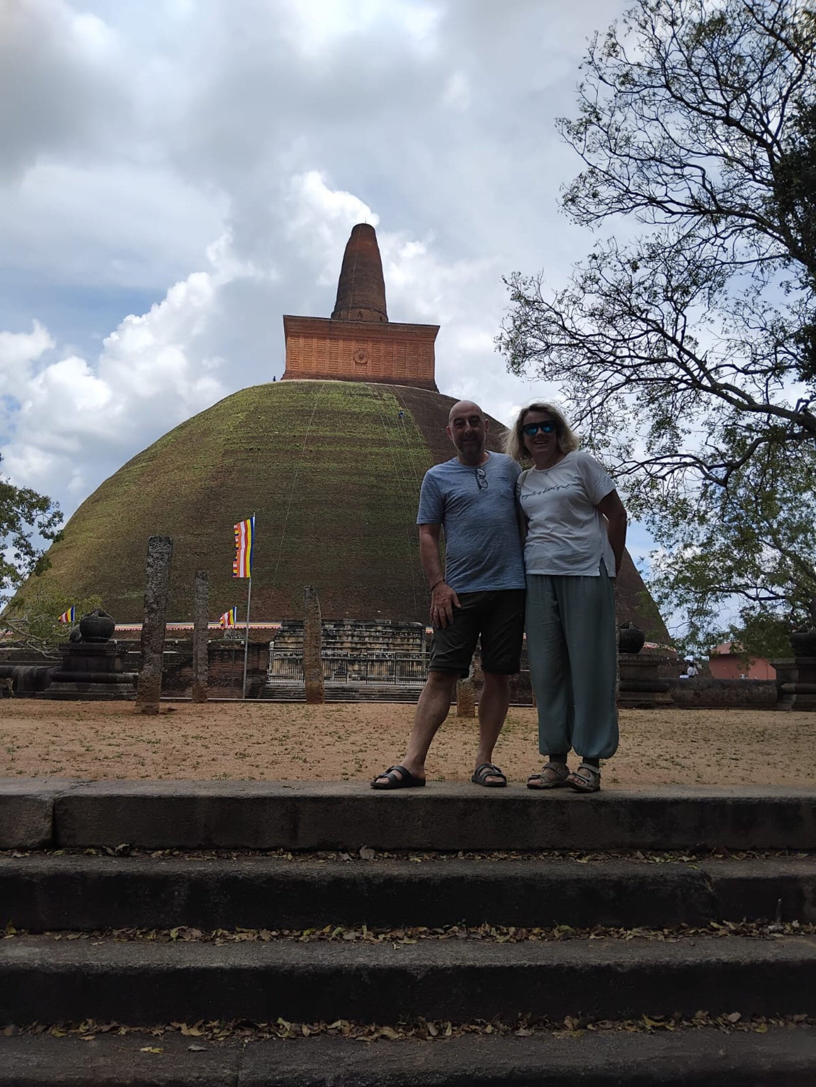 Travellers at an ancient stupa in Sri Lanka's cultural triangle